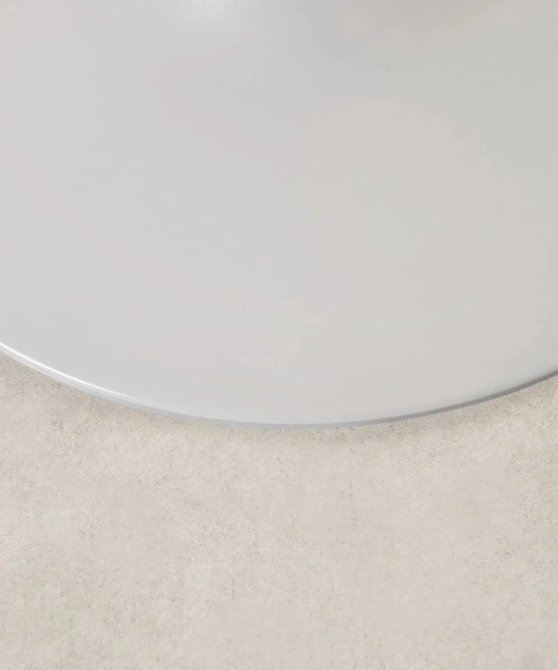 Mesa redonda de metal y fibra de vidrio Tulia (80 cm)