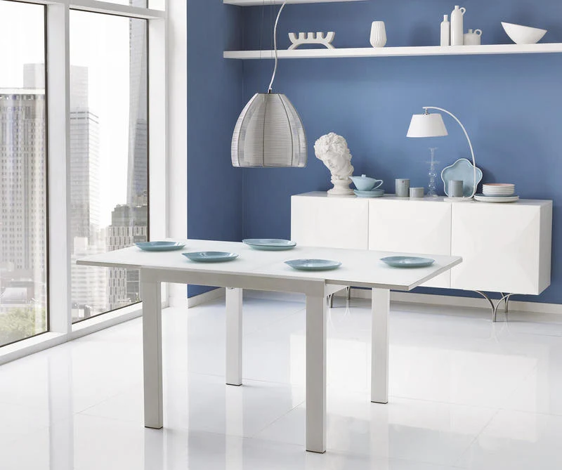 Tavolo design da salotto allungabile con base in metallo colore bianco