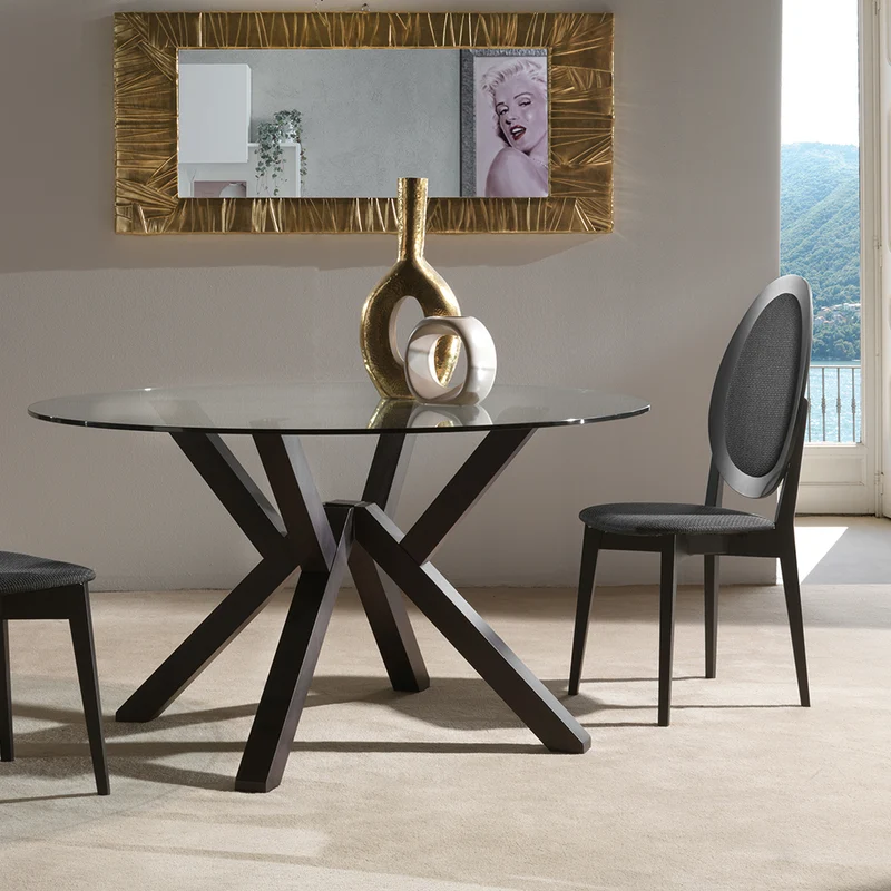 Teorema - Tavolo rotondo fisso con piano in vetro e gambe in legno massello cm 120x76h - vari colori