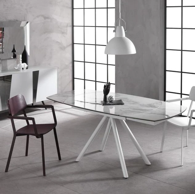 Tavolo moderno allungabile girevole con piano in ceramica effetto marmo cm 120/180x90x76h