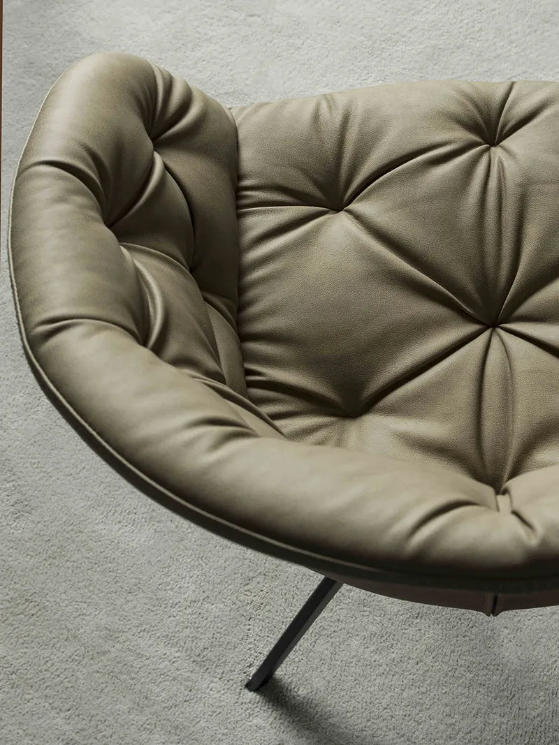 Cabiria - Poltroncina moderna in metallo rivestita in ecopelle cm 61x52x81h - vari colori