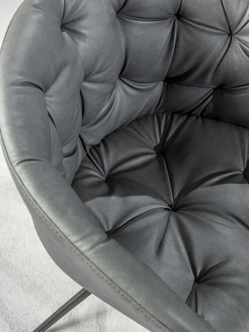 Cabiria - Poltroncina moderna in metallo rivestita in ecopelle cm 61x52x81h - vari colori