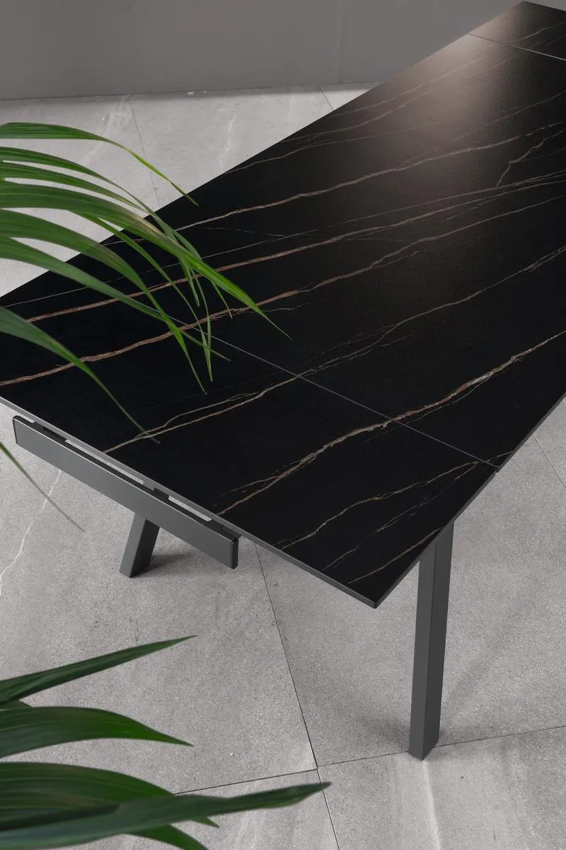 Tavolo allungabile piano effetto marmo nero gambe in metallo cm 140/200x80x76h
