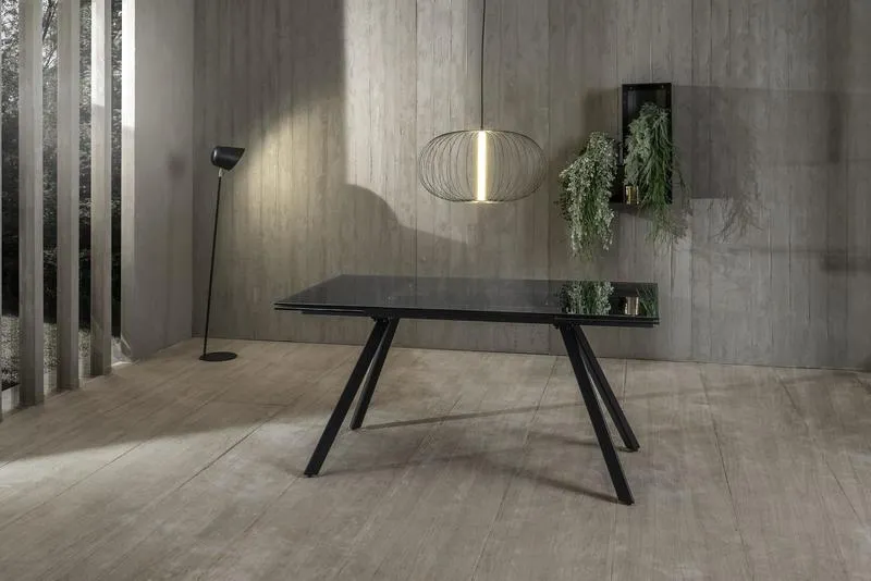 Tavolo design allungabile piano in vetro fumè gambe in metallo nero cm 160/240x90x76h