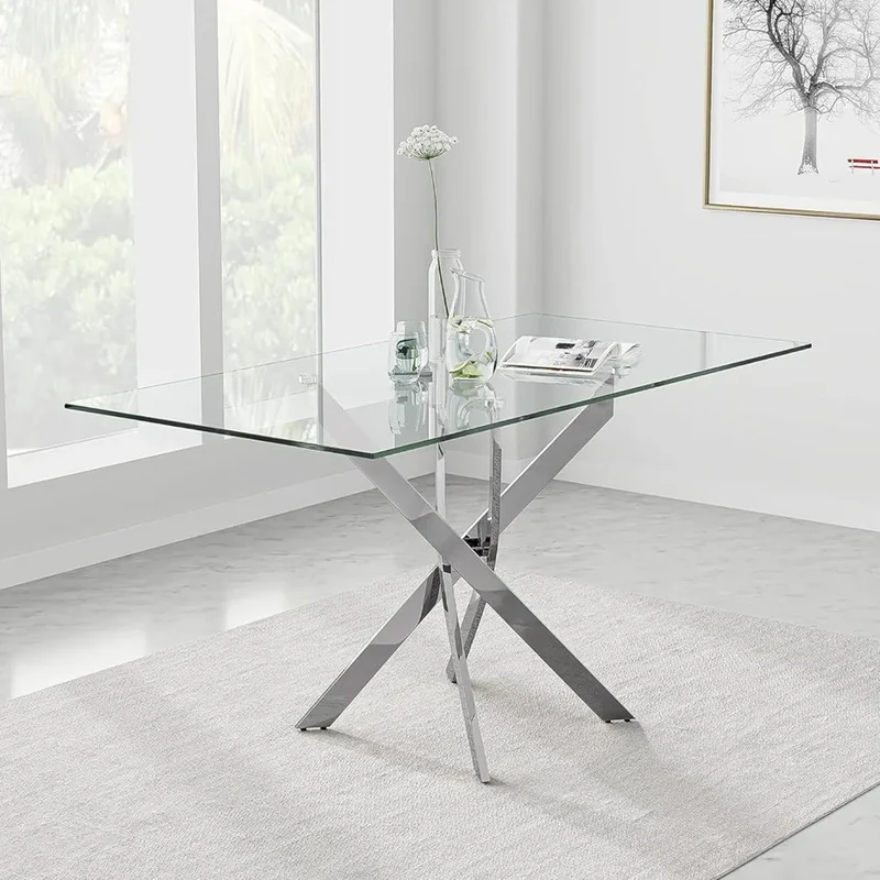 Tavolo "Terra" con gambe incrociate in metallo cromato e piano in vetro temperato, design moderno per arredo interno
