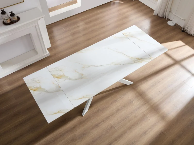Tavolo "Pollux" con gambe in ferro e piano in pietra sinterizzata 160/240 x 110 x h 75 cm