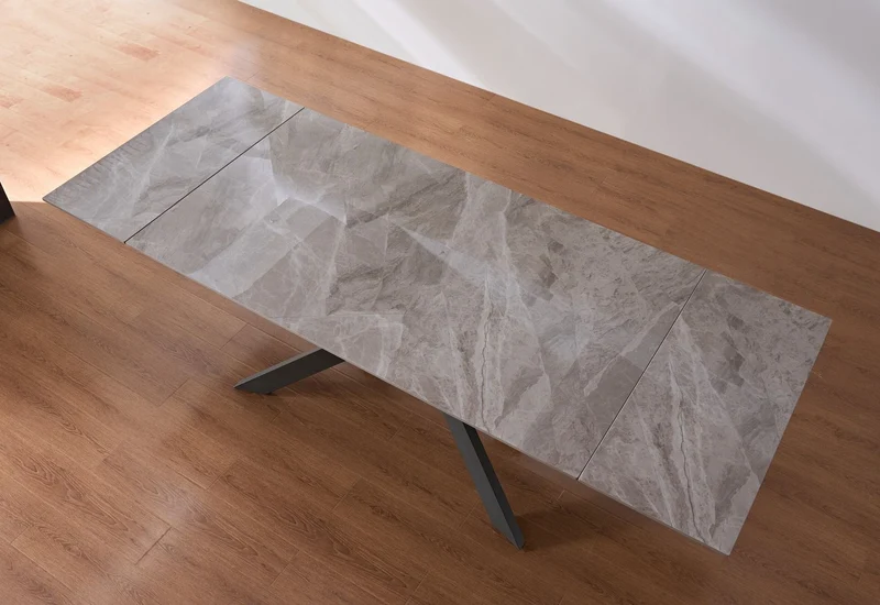 Tavolo "Pollux" con gambe in ferro e piano in pietra sinterizzata 160/240 x 110 x h 75 cm