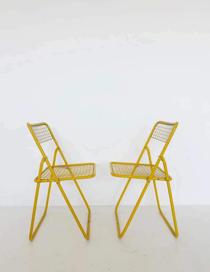 Coppia sedie Ted Net Gialle di Niels Gammelgaard per Ikea 1980