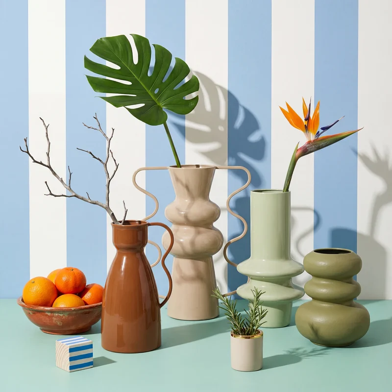 Virella - Vaso per fiori decorativo in metallo arancione stile moderno