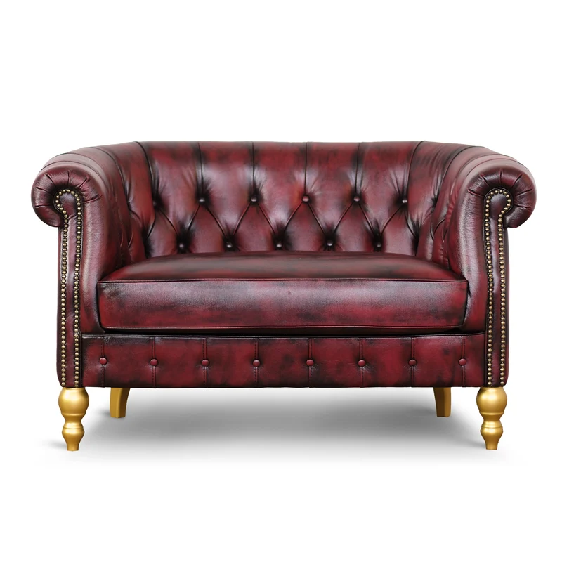Divano Chesterino in pelle fiore bordeaux stile old America rifinita a mano