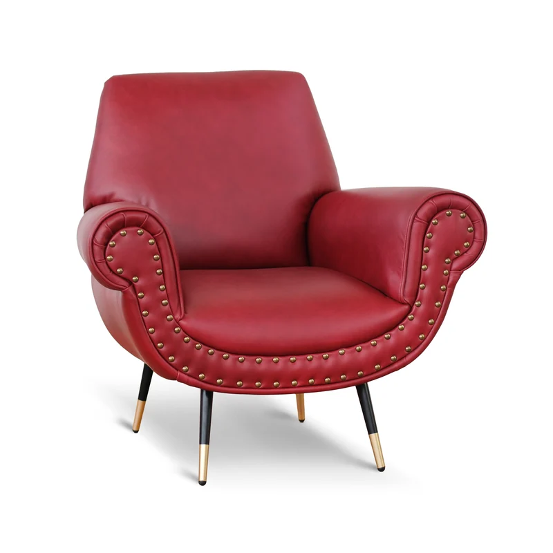 Poltrona design vintage Vico pelle fiore pull up rosso ciliegia con borchie anticate e gambe nere e ottone