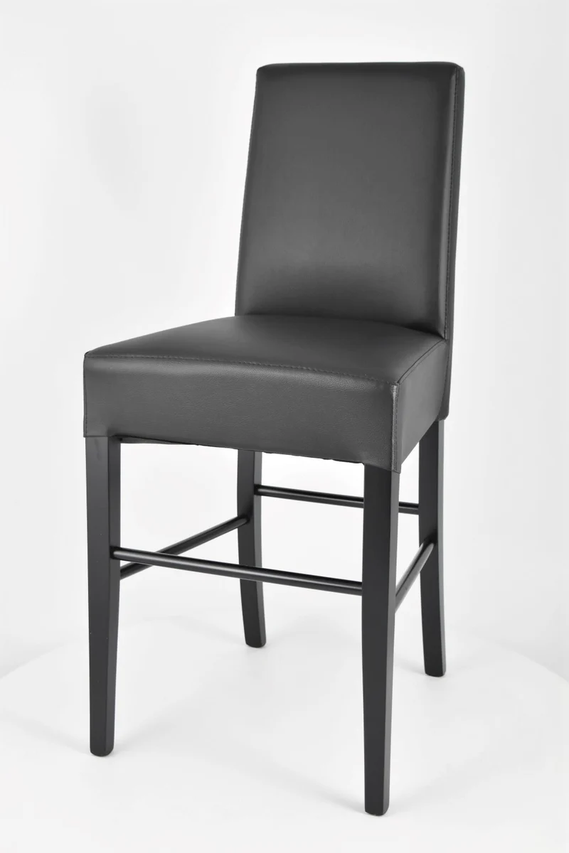 Sgabello basso modello Luisa con struttura in legno di faggio, seduta e schienale imbottiti e rivestiti in pelle artificiale + colori