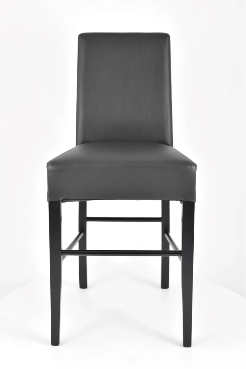 Sgabello basso modello Luisa con struttura in legno di faggio, seduta e schienale imbottiti e rivestiti in pelle artificiale + colori