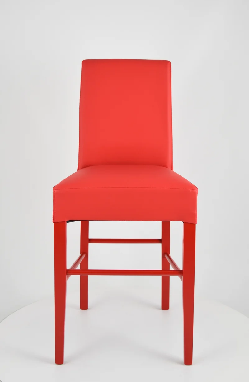 Sgabello basso modello Luisa con struttura in legno di faggio, seduta e schienale imbottiti e rivestiti in pelle artificiale + colori