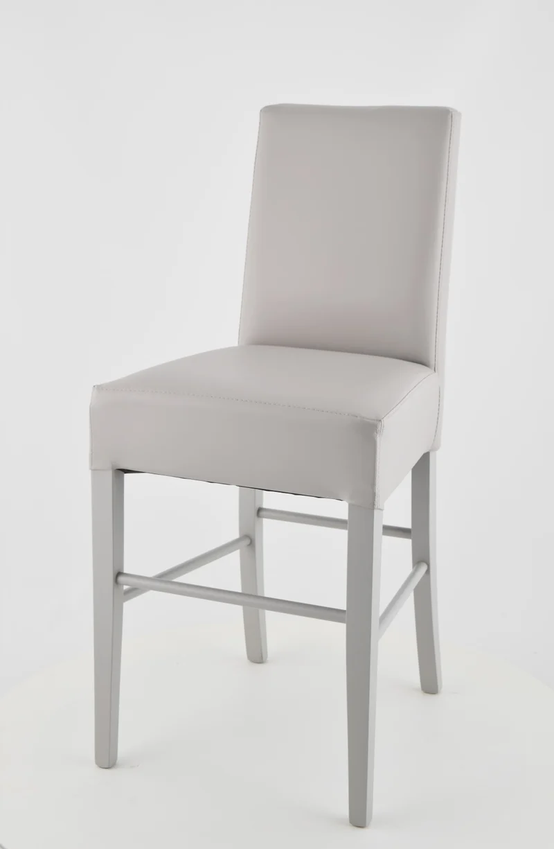 Sgabello basso modello Luisa con struttura in legno di faggio, seduta e schienale imbottiti e rivestiti in pelle artificiale + colori