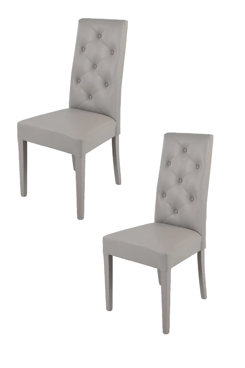 Set sedie modello Chantal con struttura in legno di faggio verniciata, seduta e schienale con bottoni imbottiti e rivestiti in pelle artificiale
