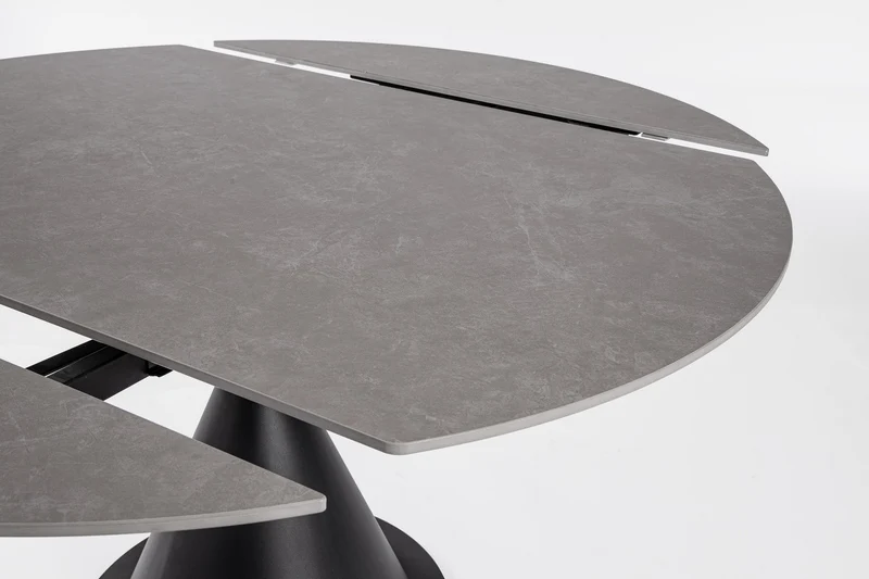 Tavolo rotondo allungabile in gres porcellanato effetto marmo 85-135 cm