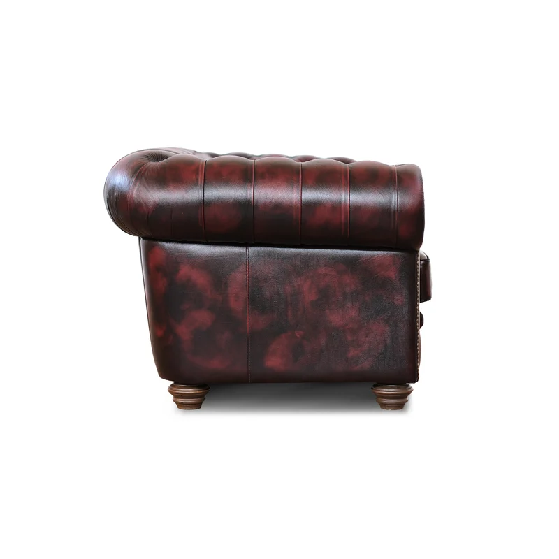 Divano Chesterfield pelle fiore bordeaux stile old America rifinita a mano
