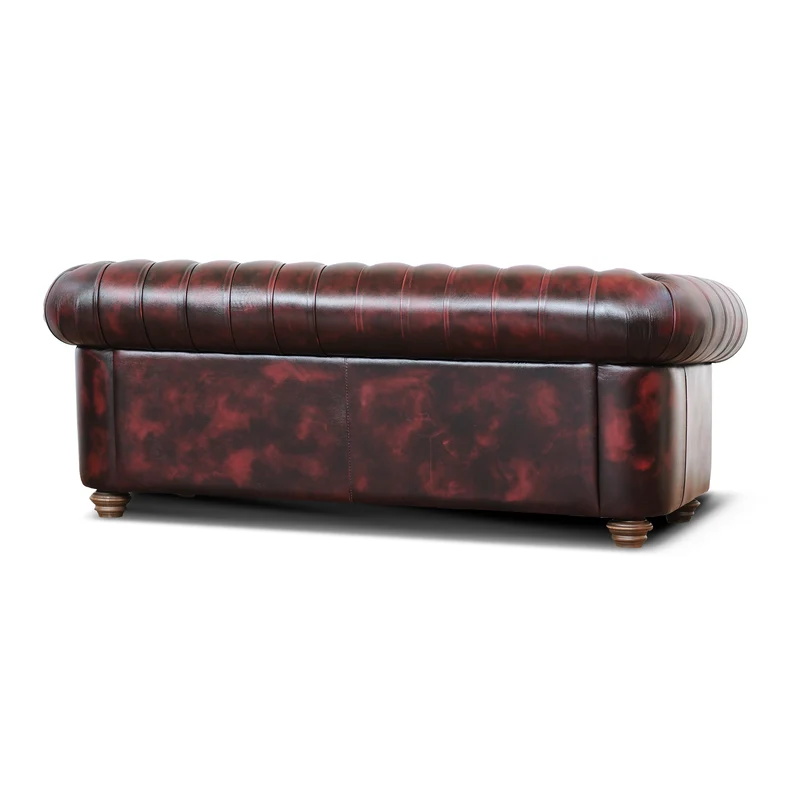 Divano Chesterfield pelle fiore bordeaux stile old America rifinita a mano