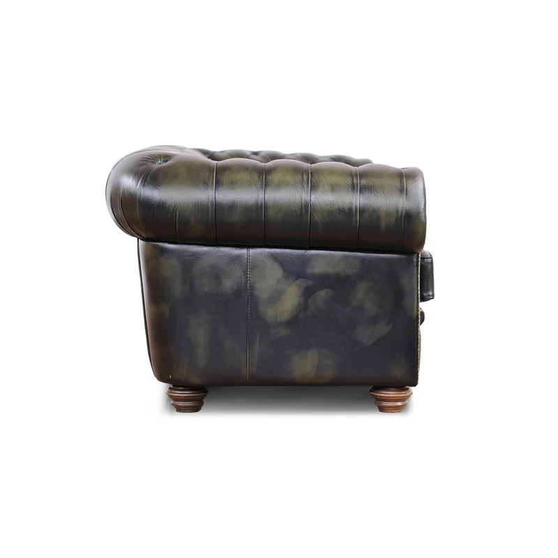Divano Chesterfield pelle fiore verde stile old America rifinita a mano